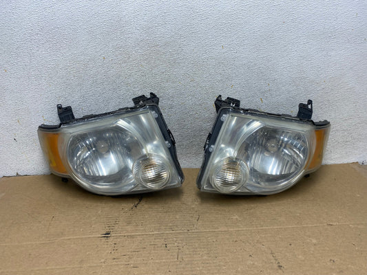 2008 to 2012 Ford Escape Headlights Left+Right Side Set Halogen AH8021 LK0