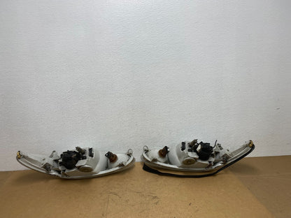 1998 to 2003 Ford Escort Left+Right Set Halogen Headlight AC1837 DW5