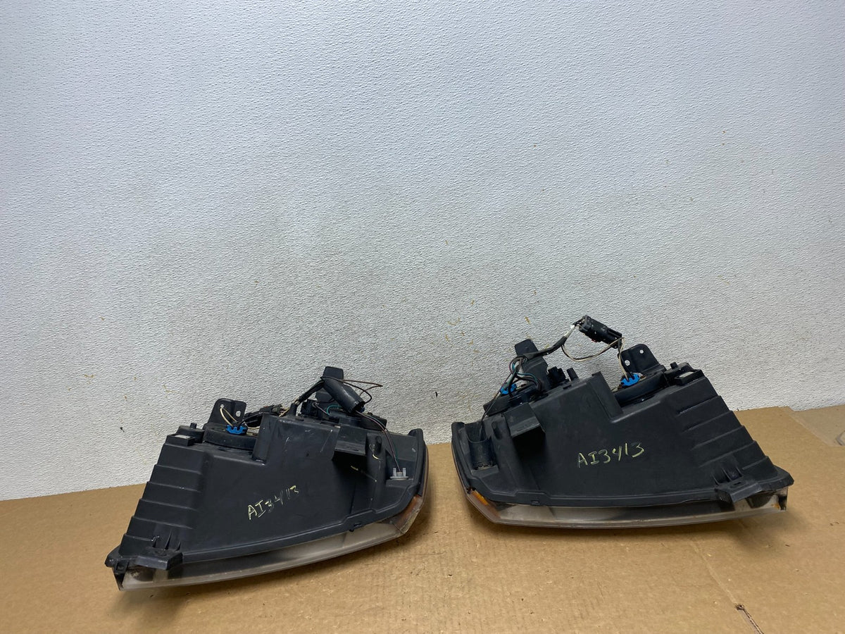 2005-2007 Jeep Grand Cherokee Left+Right Halogen Headlights AI3413 DW10