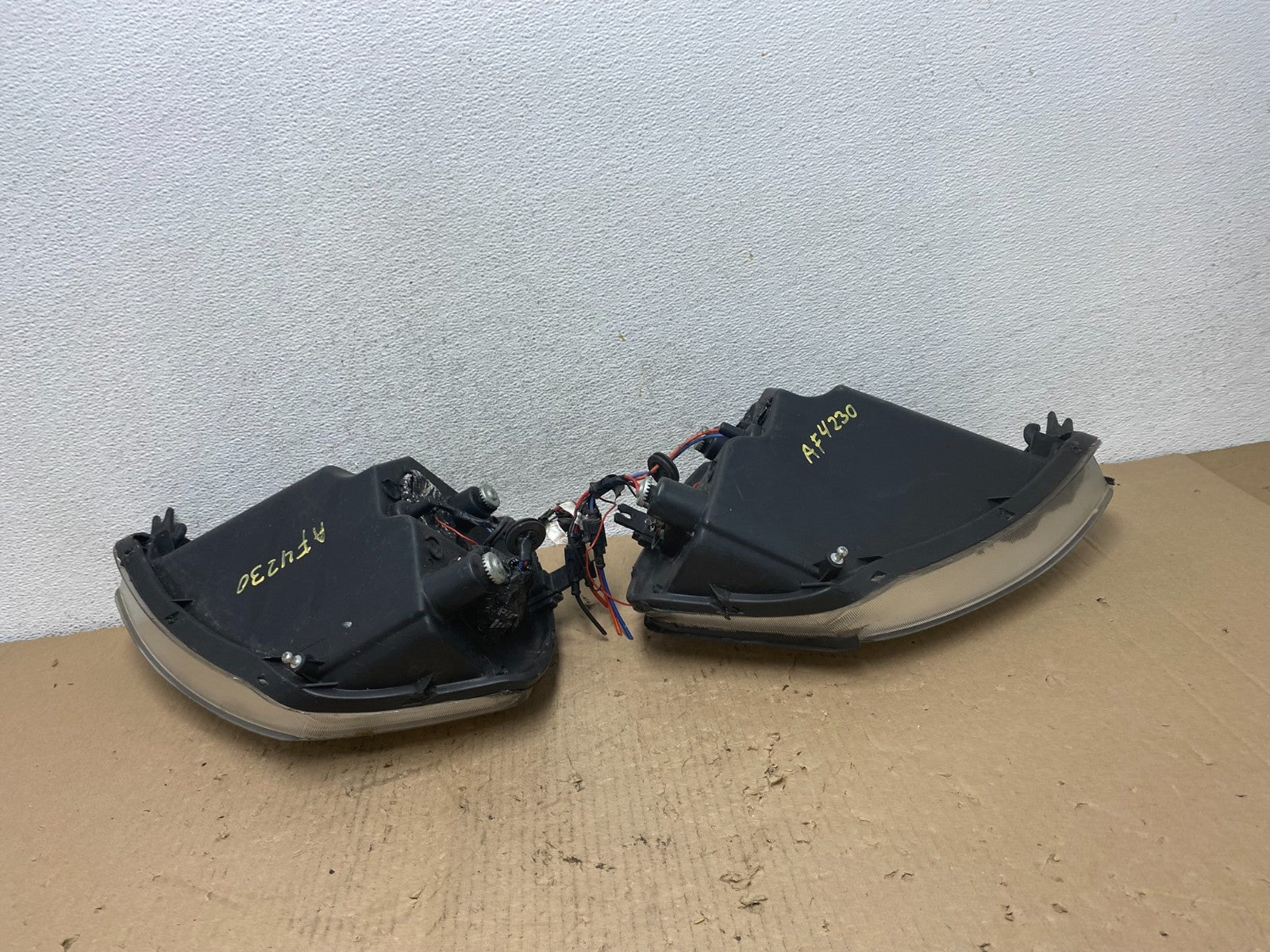 2000-2005 Mitsubishi Eclipse Left+Right Set Halogen Headlights AF42307
