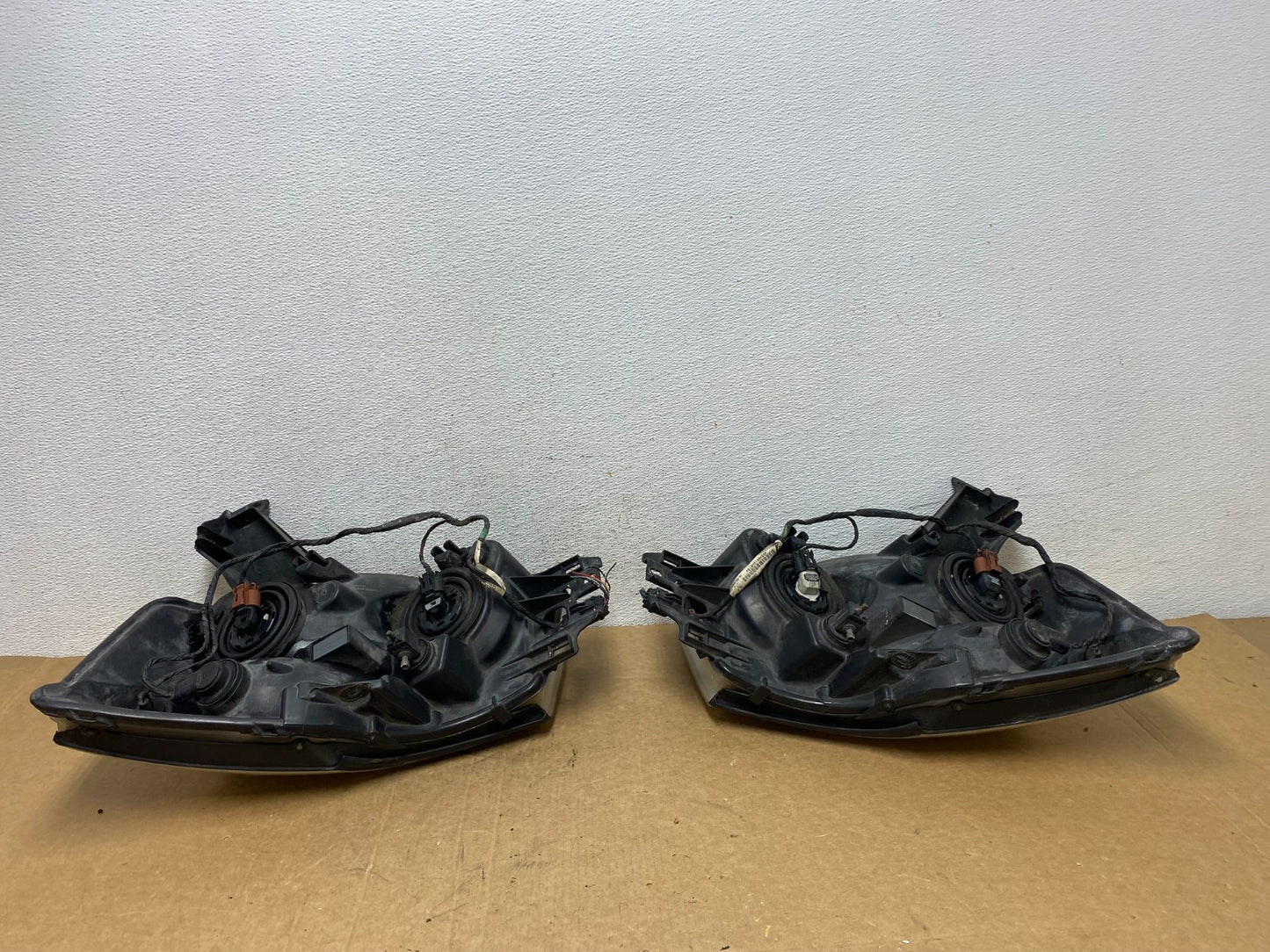 2004 to 2007 Nissan Armada Left+Right Side Set Headlights AD6132 DW9