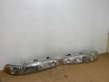 1998 to 2002 Oldsmobile Intrigue Left+Right Side Halogen Headlights AD4373 DG2
