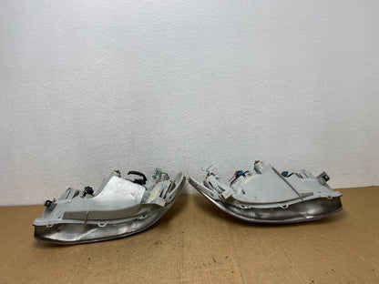2003 to 2004 Toyota Corolla Left+Right Side Set Headlights AD0645 DW7