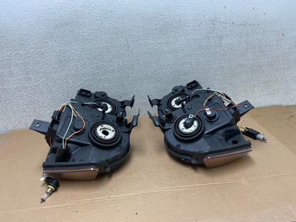 2009-2010 Jeep Grand Cherokee Left+Right Set Halogen Headlights AA9867 DW8