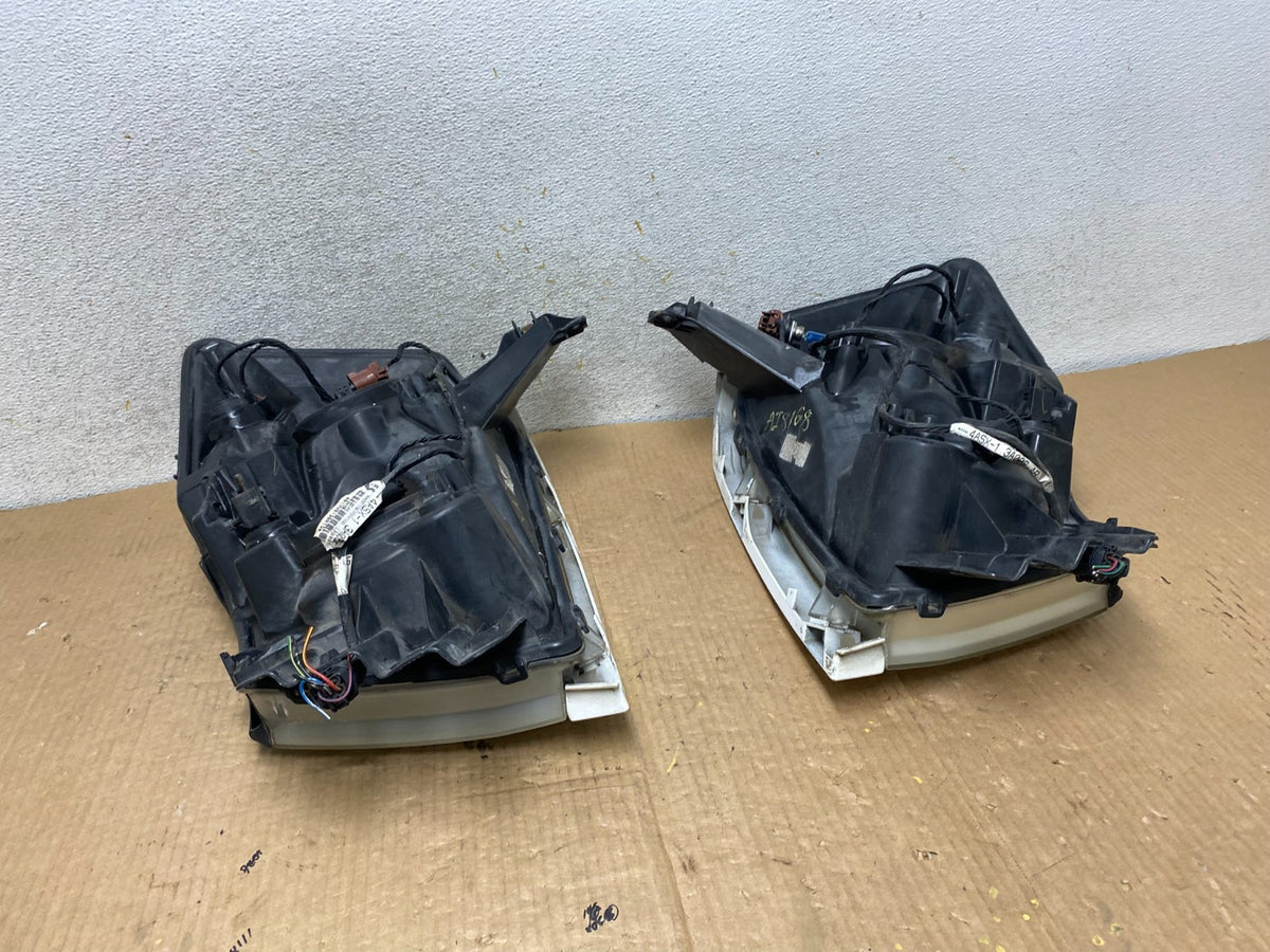 2004 to 2007 Nissan Armada Left+Right Side Set Headlights AI8168 DW12