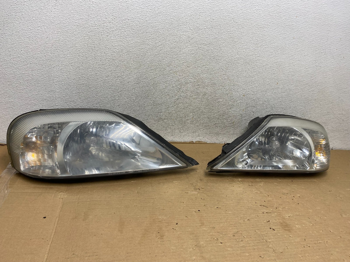 2000 to 2005 Mercury Sable Left+Right Side Halogen Headlights AG9233 DW1