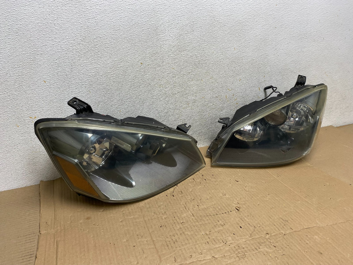 2005 to 2006 Nissan Altima Left+Right Set Halogen Headlights AI1239 DW2