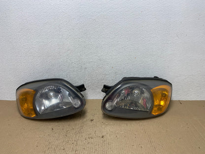 2003 to 2006 Hyundai Accent Left+Right Halogen Headlights AF2824 DW0