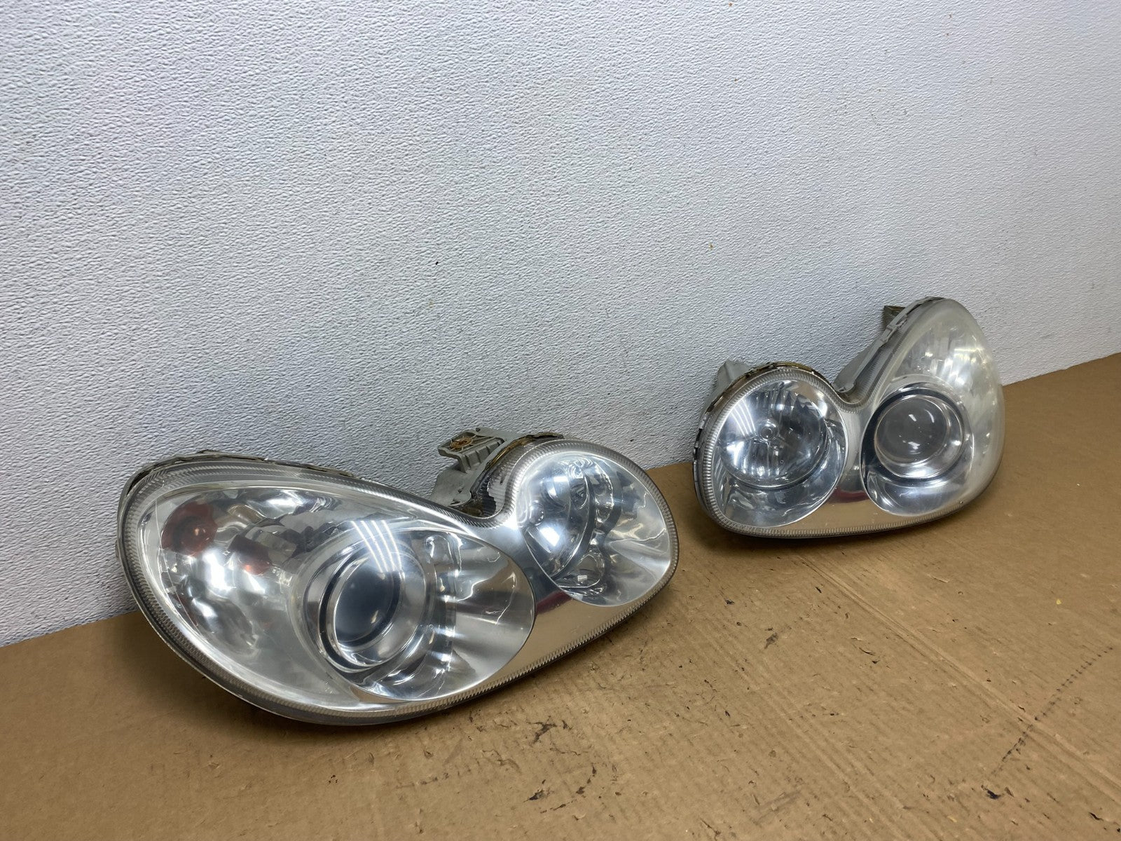 2002 - 2005 Hyundai Sonata Left+Right Headlights Halogen AC7719 DW2