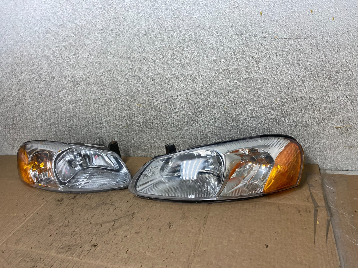 2001 to 2002 Chrysler Sebring Left+Right Side Headlights Z1055 DW1
