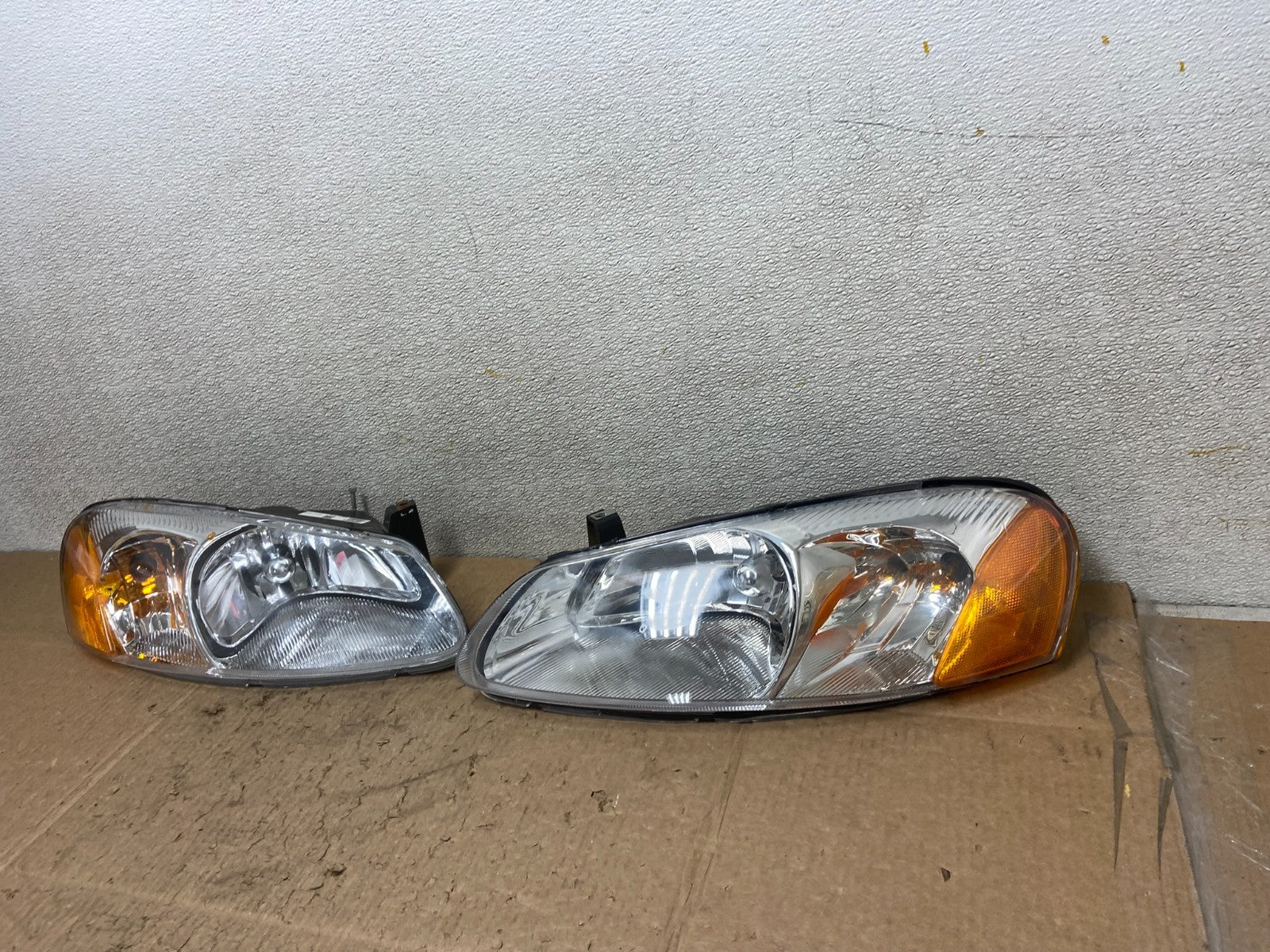 2001 to 2002 Chrysler Sebring Left+Right Side Headlights Z1055 DW1