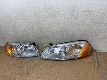 2001 to 2002 Chrysler Sebring Left+Right Side Headlights Z1055 DW1