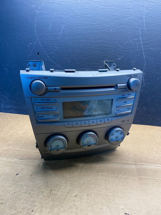 2007 to 2009 Toyota Camry Radio CD Player Climate Control Bezel AD7345 DG0