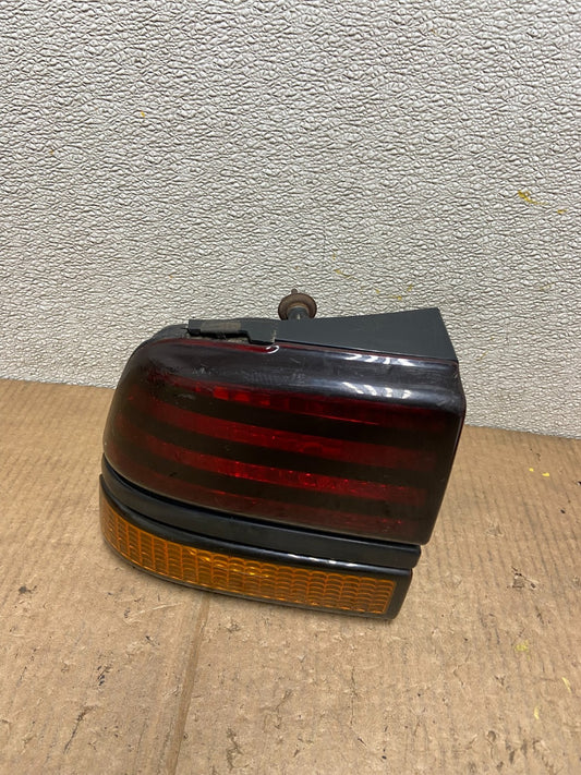 1988 to 1994 Pontiac Sunbird Left Driver Side Tail Light AA65930
