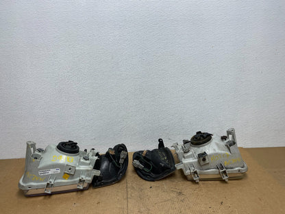 1999-2004 Nissan Pathfinder Left+Right Side Set Halogen Headlights AC3441 DW7
