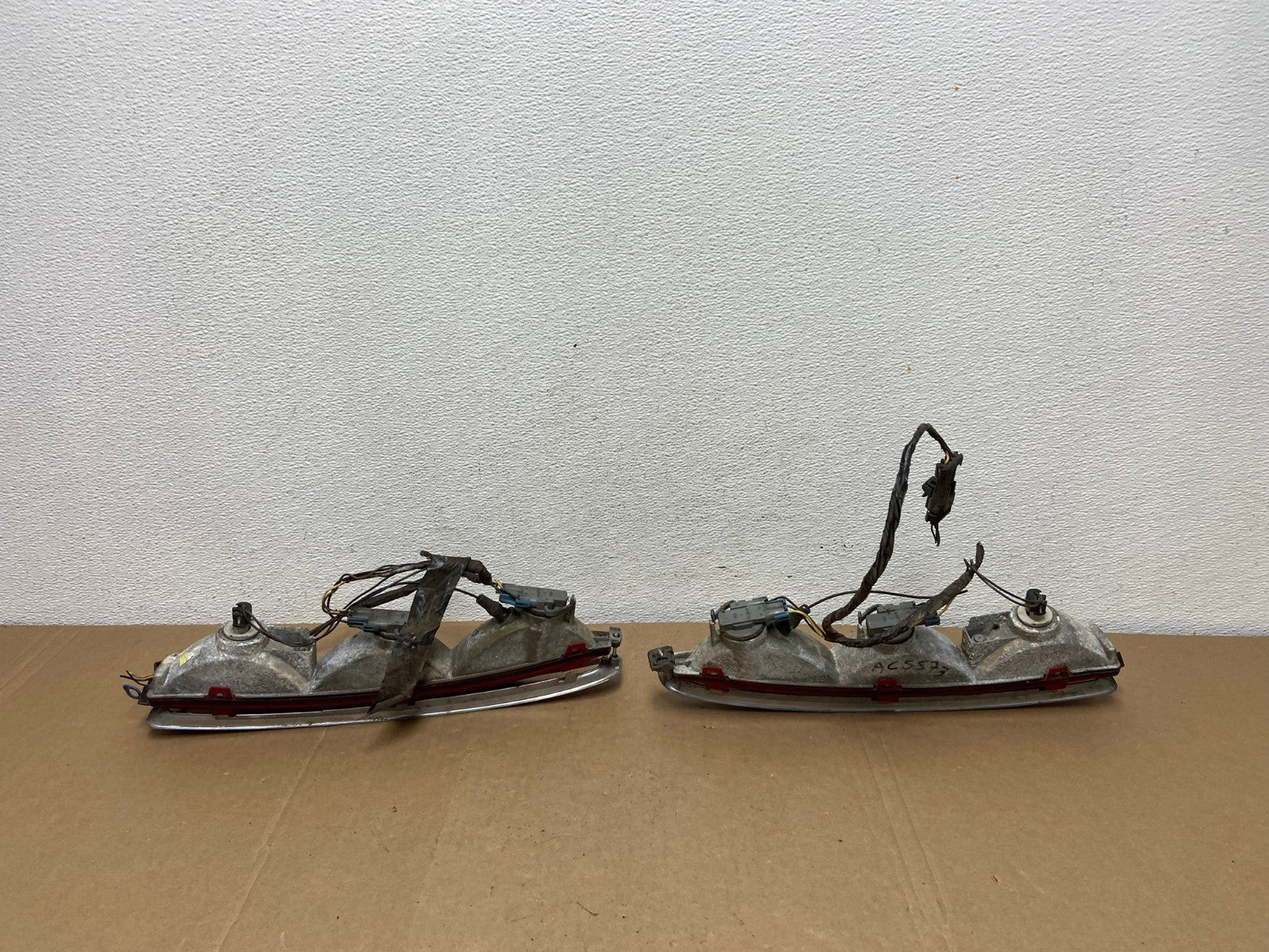 1994 to 1999 Cadillac Deville Left+Right Side Tail lights OEM AC5573 LK4