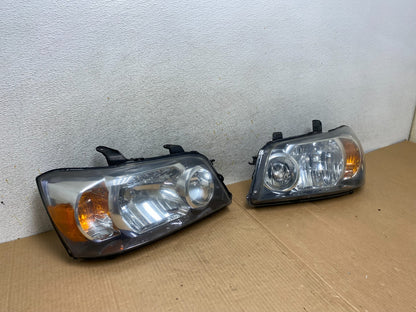 2004 2005 2006 Toyota Highlander Headlights Left+Right Side TYC AI5749 DW2