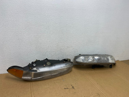 1997 to 1998 Mitsubishi Galant Left+Right Set Headlights Halogen AD2675 DW2