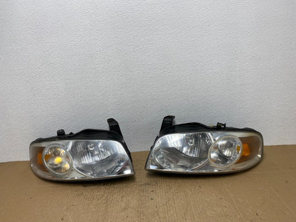 2004 - 2006 Nissan Sentra Halogen Left+Right Headlights AB8409 DW0