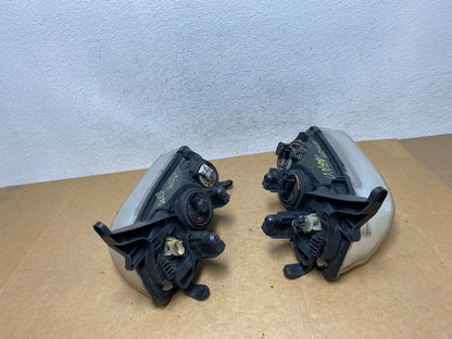 2000 to 2002 Saturn L Series Headlights Left+Right Side AE2945 DW9