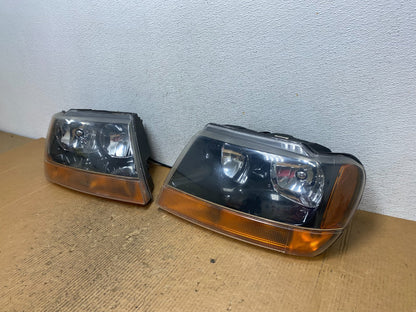 1999 - 2004 Jeep Grand Cherokee Left+Right Set Halogen Headlights AE2883 DW1