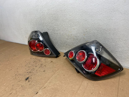 2007 to 2010 Scion TC Left + Right Set Black Tail Lights AI9311 LK1