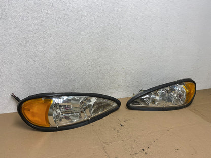 1999 to 2005 Pontiac Grand Am Left+Right Set Headlights AF4474 DW2