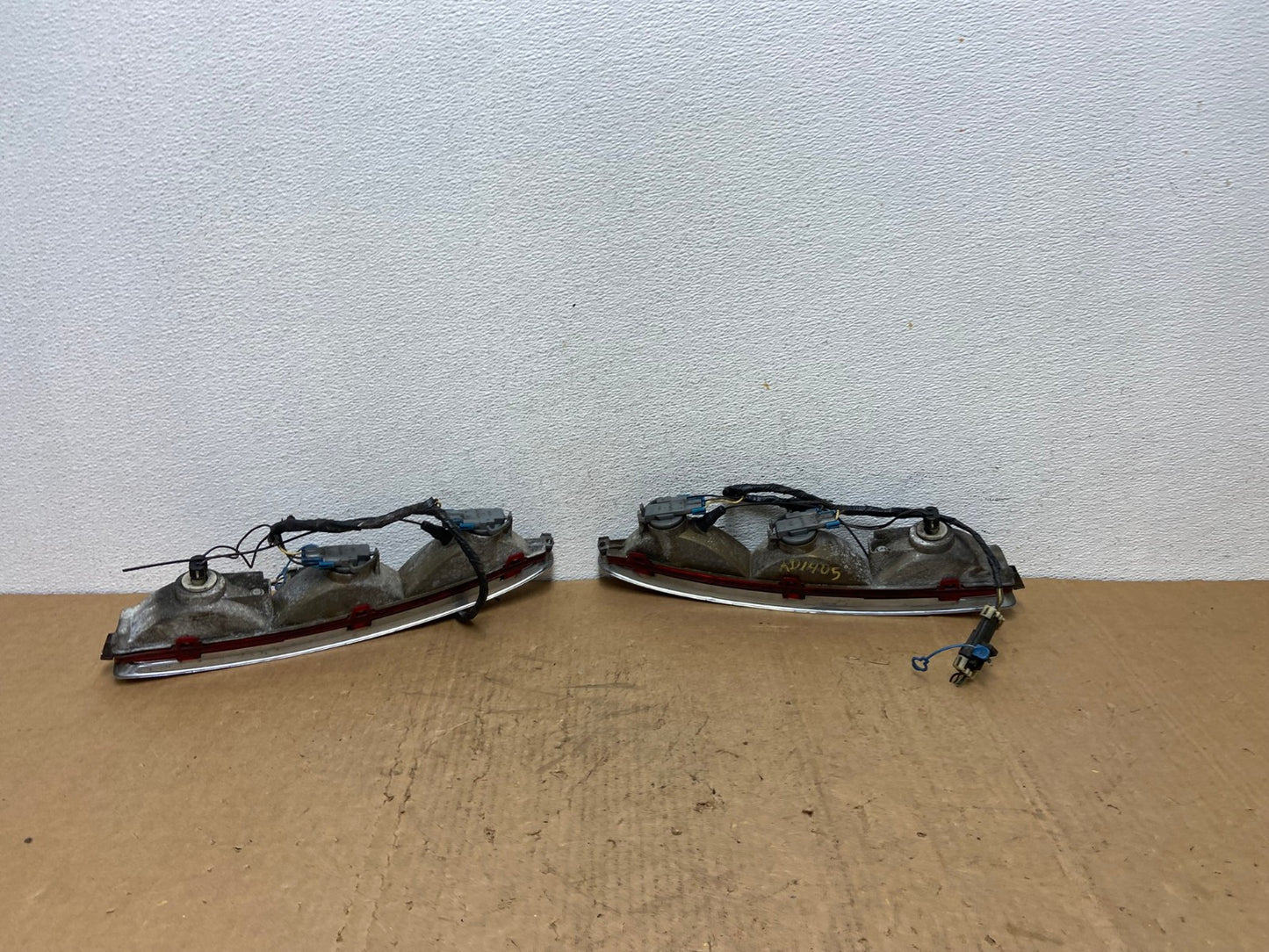 1994 to 1999 Cadillac Deville Left+Right Side Tail lights AD1405 LK3