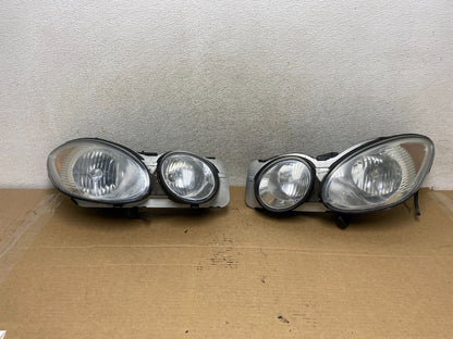 2005 to 2008 Buick Lacrosse Allure Headlights Left+Right Halogen AH3128 DW0