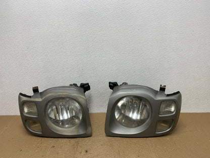 2002 2003 2004 Nissan Xterra Left+Right Side Headlights AC6020 DW0