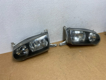 2001-2002 Toyota Corolla Left+Right Side Halogen Headlights AD4483 DW2