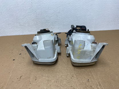 1999-2004 Nissan Pathfinder Left+Right Side Set Halogen Headlights AC5824 DW12