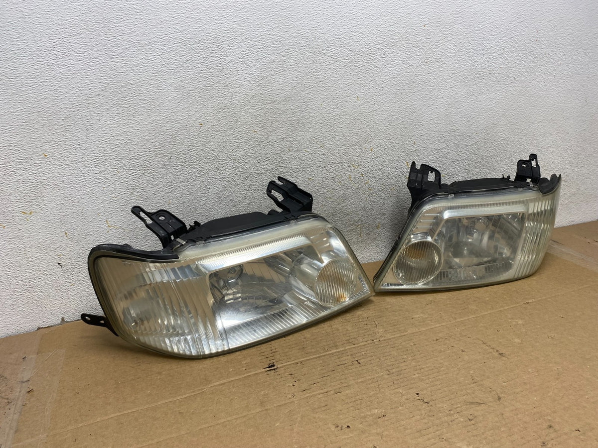 2005 to 2007 Mercury Mariner Left+Right Side Halogen Headlights AH7925 DW1