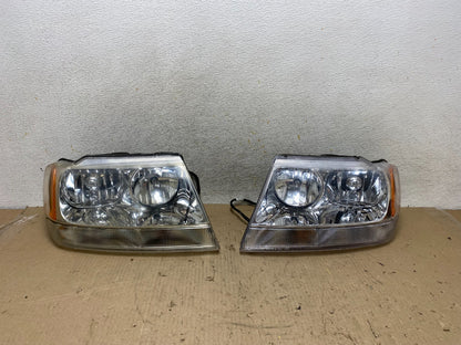 1999 - 2004 Jeep Grand Cherokee Left+Right Set Halogen Headlights AH7653 DW0
