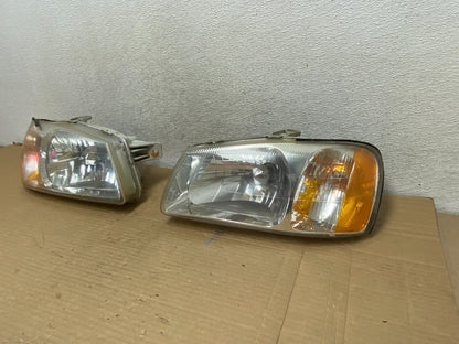 2000 to 2002 Hyundai Accent Left+Right Halogen Headlights AG8955 DW2