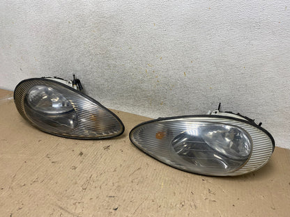 1996 to 1999 Mercury Sable Left+Right Side Set Halogen Headlights AH7690 DW2
