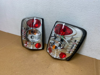 1999-2004 Jeep Grand Cherokee Left + Right Set Chrome Tail Lights AD8971 DG1