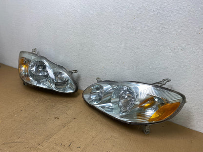 2003 to 2004 Toyota Corolla Left+Right Side Set Headlights AD0645 DW1