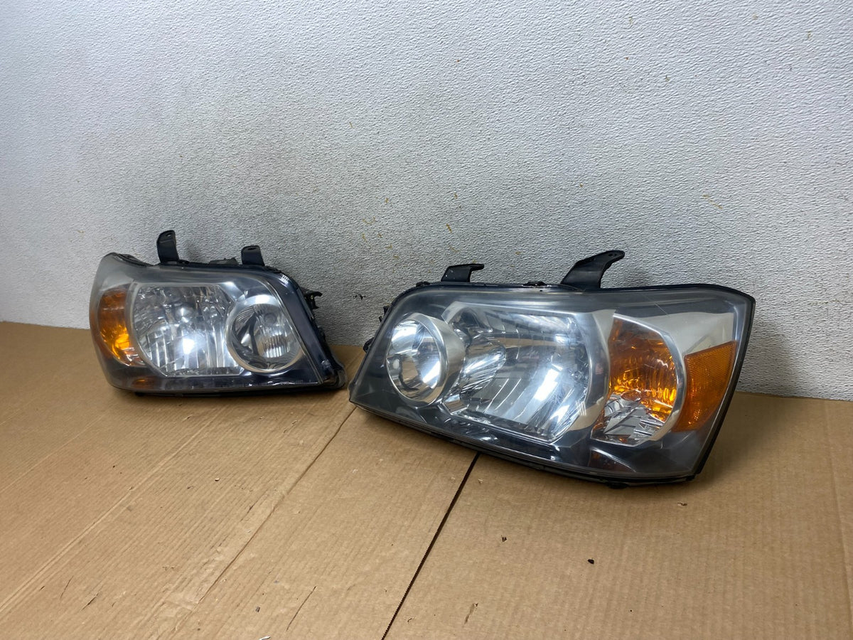 2004 2005 2006 Toyota Highlander Headlights Left+Right Side TYC AI5749 DW1