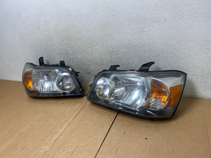 2004 2005 2006 Toyota Highlander Headlights Left+Right Side TYC AI5749 DW1