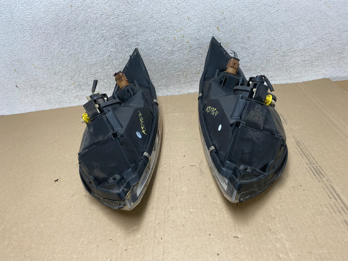 1999 to 2003 Ford Windstar Left+Right Halogen Headlights AJ1964 DW10