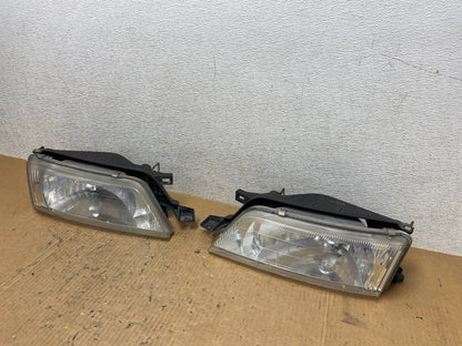 1997 to 1999 Nissan Maxima Left+Right Side Headlights Halogen OEM Q7728 DW1