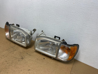 1999-2004 Nissan Pathfinder Left+Right Side Set Halogen Headlights Oem AC3404 DW1