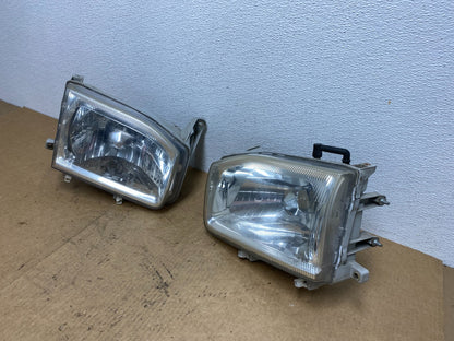 1999-2004 Nissan Pathfinder Left+Right Side Set Halogen Headlights AC3323 DW1