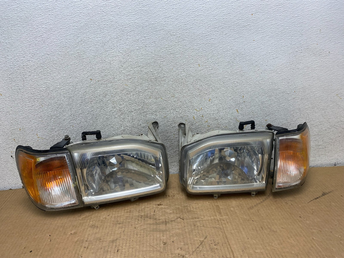 1999-2004 Nissan Pathfinder Left+Right Side Set Halogen Headlights AI7822 DW0