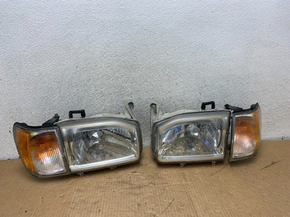 1999-2004 Nissan Pathfinder Left+Right Side Set Halogen Headlights AI7822 DW0