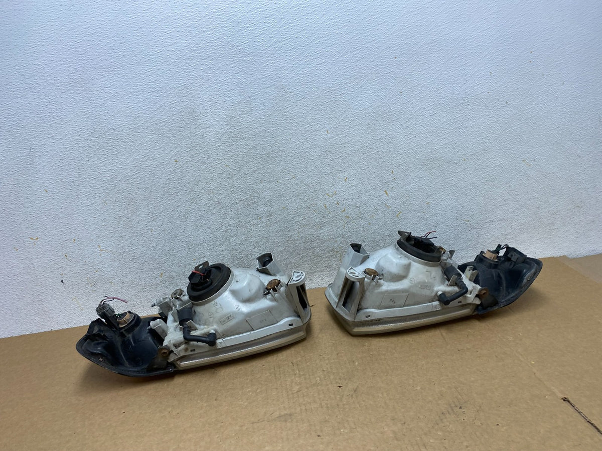 1999-2004 Nissan Pathfinder Left+Right Side Set Halogen Headlights AI2646 DW8