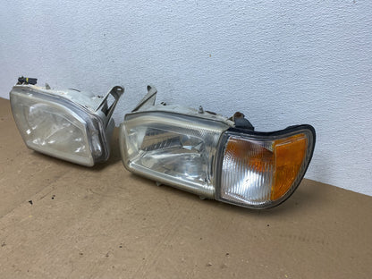1999-2004 Nissan Pathfinder Left+Right Side Set Halogen Headlights AC5824 DW1