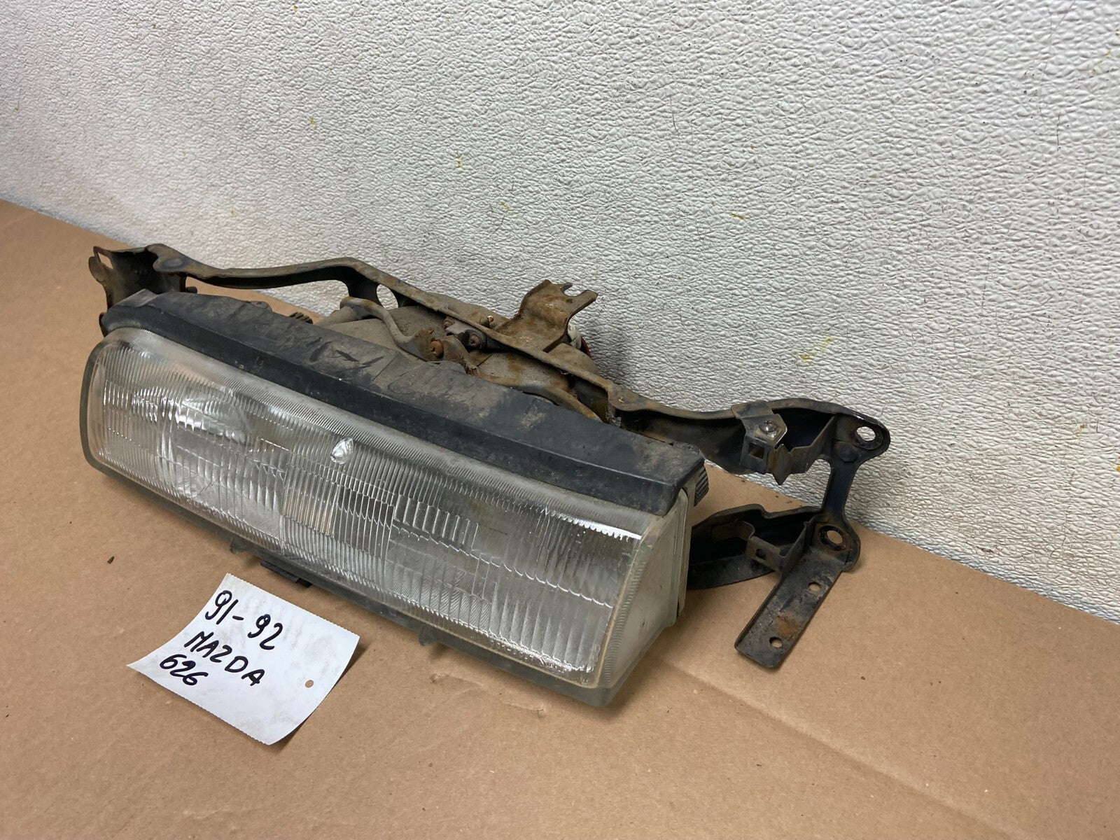 1988 to 1992 Mazda 626 Left Driver LH Headlight  Halogen E0860 DG11