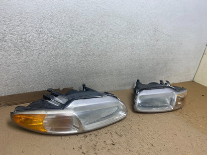1996-2000 Chrysler Sebring Left+Right Side Halogen Headlights U2411 DW2